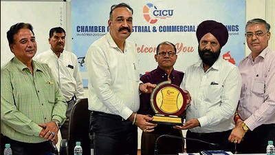 MC Commissioner Sandeep Rishi during a meeting with industrial representatives organised by the Chamber of Industrial and Commercial Undertakings in Ludhiana. (HT)