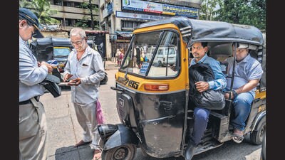 Mumbai, India - Aug. 30, 2023: The RTO had initiated action against the offence over sitting in auto reshow with the help of the traffic police at Kurla West in Mumbai, India, on Wednesday, August 30, 2023. (Photo by Satish Bate/ Hindustan Times) (Hindustan Times) Mumbai, India - Aug. 30, 2023: The RTO had initiated action against the offence over sitting in auto reshow with the help of the traffic police at Kurla West in Mumbai, India, on Wednesday, August 30, 2023. (Photo by Satish Bate/ Hindustan Times) (Hindustan Times)