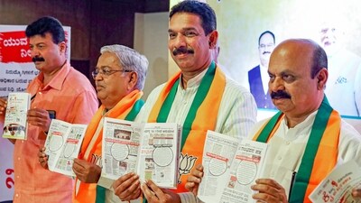 Former CM Bommai, state's BJP President Nalin Kumar Kateel and former minister Govind Karjol release a book alleging failures of the Congress-led state government. (PTI) Former CM Bommai, state's BJP President Nalin Kumar Kateel and former minister Govind Karjol release a book alleging failures of the Congress-led state government. (PTI)