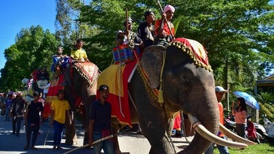 Participants ride on elephants during a parade welcoming the Islamic New Year and celebrating the culture and traditions of Thailand's southern province of Narathiwat, in Narathiwat. Thailand likely to ease visa rules to lure tourists from China and India (Photo by Madaree TOHLALA / AFP) Participants ride on elephants during a parade welcoming the Islamic New Year and celebrating the culture and traditions of Thailand's southern province of Narathiwat, in Narathiwat. Thailand likely to ease visa rules to lure tourists from China and India (Photo by Madaree TOHLALA / AFP)
