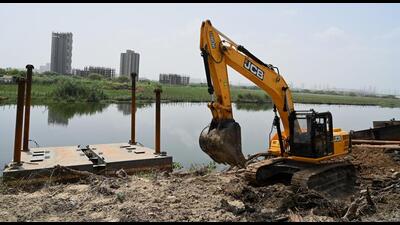 The Najafgarh drain being paved in Dharampur. (Parveen Kumar/HT Photo)
