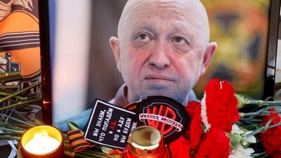 A view shows a portrait of Wagner mercenary chief Yevgeny Prigozhin at a makeshift memorial in Moscow, Russia. (Reuters)