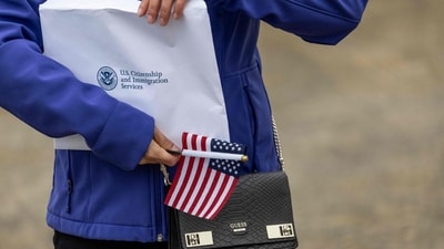UTQIAGVIK, ALASKA - AUGUST 10: A new American citizen hlds an envelope with her U.S. citizenship certificate following a naturalization ceremony on August 10, 2023 . John Moore/Getty Images/AFP (Photo by JOHN MOORE / GETTY IMAGES NORTH AMERICA / Getty Images via AFP) (Getty Images via AFP) UTQIAGVIK, ALASKA - AUGUST 10: A new American citizen hlds an envelope with her U.S. citizenship certificate following a naturalization ceremony on August 10, 2023 . John Moore/Getty Images/AFP (Photo by JOHN MOORE / GETTY IMAGES NORTH AMERICA / Getty Images via AFP) (Getty Images via AFP)