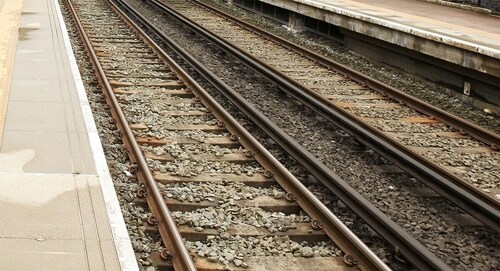 The darker raised rails seen here are known as the third rail (NetworkRail) The darker raised rails seen here are known as the third rail (NetworkRail)