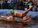 Wrestlers Joe Blashill and El Bisto in the World Gravy Wrestling Championships. 