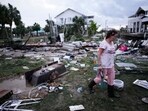 Jewell Baggett walks amidst debris strewn across the yard where her mother’s home had stood, as she searches for anything salvageable from the trailer home her grandfather had acquired in 1973 and built multiple additions on to over the decades, in Horseshoe Beach, Fla., after the passage of Hurricane Idalia, Wednesday, Aug. 30, 2023. (Source: AP) Jewell Baggett walks amidst debris strewn across the yard where her mother’s home had stood, as she searches for anything salvageable from the trailer home her grandfather had acquired in 1973 and built multiple additions on to over the decades, in Horseshoe Beach, Fla., after the passage of Hurricane Idalia, Wednesday, Aug. 30, 2023. (Source: AP)