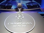 The Champions League Trophy stands on display during the UEFA Champions League football group stage draw ceremony. The Champions League Trophy stands on display during the UEFA Champions League football group stage draw ceremony.
