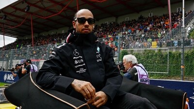 Mercedes' British driver Lewis Hamilton sits in a vintage car as he takes part in the driver's parade ahead of the Formula One Belgian Grand Prix (AFP) Mercedes' British driver Lewis Hamilton sits in a vintage car as he takes part in the driver's parade ahead of the Formula One Belgian Grand Prix (AFP)