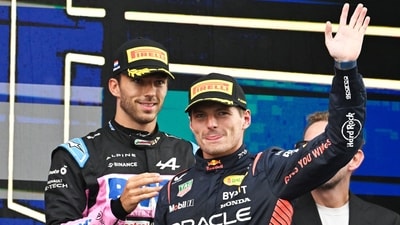 Red Bull Racing's Dutch driver Max Verstappen (C) gestures as he celebrates on the podium (AFP) Red Bull Racing's Dutch driver Max Verstappen (C) gestures as he celebrates on the podium (AFP)