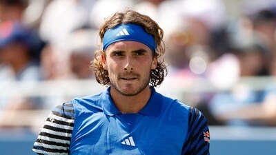 Stefanos Tsitsipas of Greece reacts after a point against Dominic Stephan Stricker of Switzerland (Getty Images via AFP) Stefanos Tsitsipas of Greece reacts after a point against Dominic Stephan Stricker of Switzerland (Getty Images via AFP)