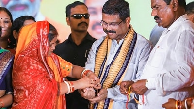 Union Minister Dharmendra Pradhan celebrates Raksha Bandhan while attending the 'Suraksha Bandhan Utsav' in Sukinda of Jajpur district. (PTI) Union Minister Dharmendra Pradhan celebrates Raksha Bandhan while attending the 'Suraksha Bandhan Utsav' in Sukinda of Jajpur district. (PTI)
