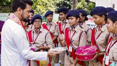Union Minister for Information & Broadcasting, Youth Affairs and Sports Anurag Singh Thakur celebrates Raksha Bandhan with NCC cadets in New Delhi. (PTI) Union Minister for Information & Broadcasting, Youth Affairs and Sports Anurag Singh Thakur celebrates Raksha Bandhan with NCC cadets in New Delhi. (PTI)