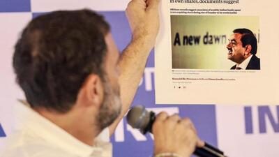 Rahul Gandhi showcasing a report published in the Guardian (Twitter/@RahulGandhi) Rahul Gandhi showcasing a report published in the Guardian (Twitter/@RahulGandhi)