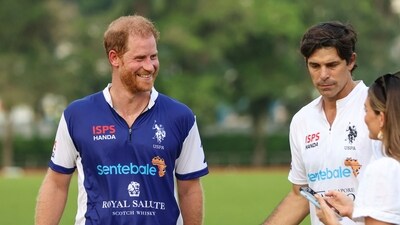 Prince Harry Heart of Invictus: Britain's Prince Harry reacts after the game in the Sentebale ISPS Handa Polo Cup in Singapore. (AP)
