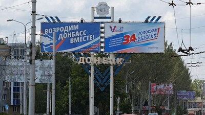 Russia-Ukraine War: A view shows banners reading "Let's revive Donbas together!" and "Vote for Donbas!" installed for the upcoming regional elections planned by the Russian-installed authorities. (Reuters)