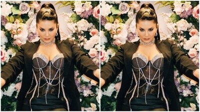 Sunny looked like a smokeshow in a black slip corset top with silver sequined lining. She teamed it with a short black skirt featuring silver sequin details at the borders. In a black blazer, she completed her look. (Instagram/@sunnyleone) Sunny looked like a smokeshow in a black slip corset top with silver sequined lining. She teamed it with a short black skirt featuring silver sequin details at the borders. In a black blazer, she completed her look. (Instagram/@sunnyleone)