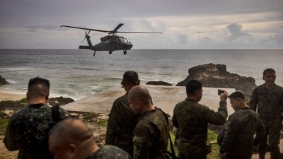 A Philippine Air Force Black Hawk helicopter lands on Thursday, June 29, 2023, at Mavulis Island, Batanes province, northern Philippines. (AP) A Philippine Air Force Black Hawk helicopter lands on Thursday, June 29, 2023, at Mavulis Island, Batanes province, northern Philippines. (AP)