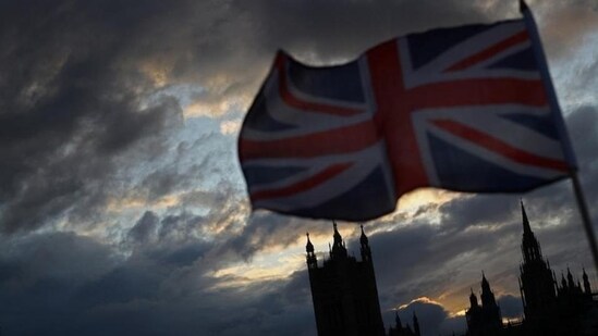 A Union Jack flag flutters in front of the Houses of Parliament in London, Britain. (Reuters)