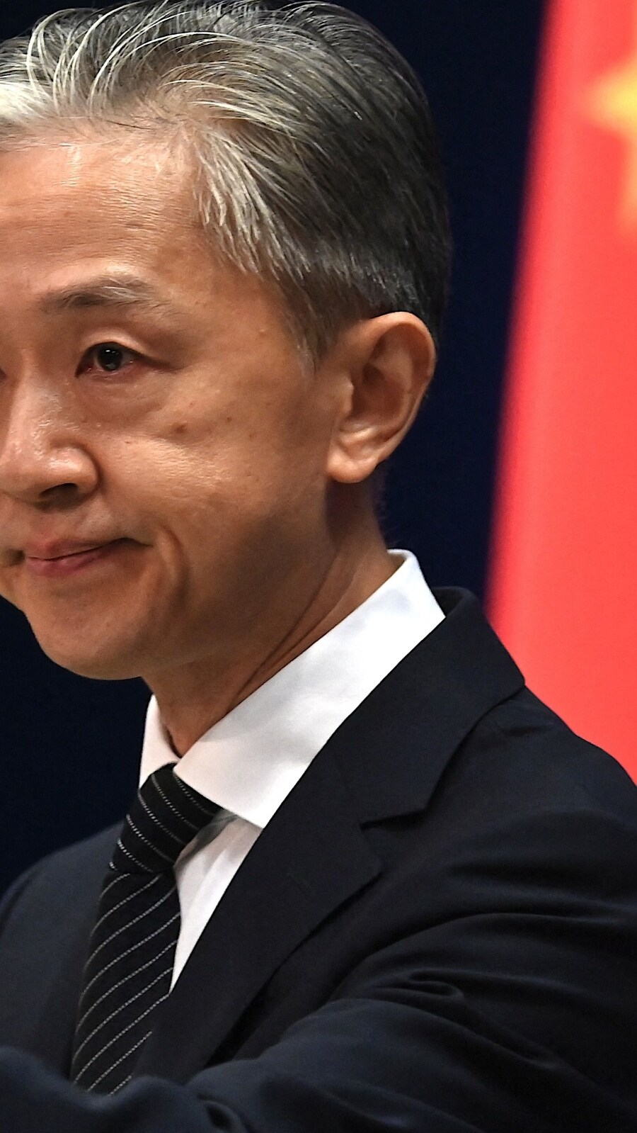 Chinese foreign ministry spokesperson Wang Wenbin gestures during a press conference at the Ministry of Foreign Affairs in Beijing. (AFP)