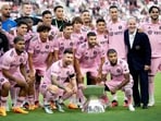 Inter Miami's Argentine forward #10 Lionel Messi (C) poses alongside teammates with the Leagues Cup trophy. Inter Miami's Argentine forward #10 Lionel Messi (C) poses alongside teammates with the Leagues Cup trophy.