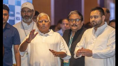 Mumbai, India - Sept. 1, 2023: RJD chief Lalu Prasad Yadav, Tejashwi Yadav and Manoj Jha arrive to attend the Opposition's Indian National Developmental Inclusive Alliance (INDIA) bloc leaders meeting, in Mumbai, India, on Friday, September 1, 2023. (Photo by Satish Bate/ Hindustan Times) (Hindustan Times) Mumbai, India - Sept. 1, 2023: RJD chief Lalu Prasad Yadav, Tejashwi Yadav and Manoj Jha arrive to attend the Opposition's Indian National Developmental Inclusive Alliance (INDIA) bloc leaders meeting, in Mumbai, India, on Friday, September 1, 2023. (Photo by Satish Bate/ Hindustan Times) (Hindustan Times)
