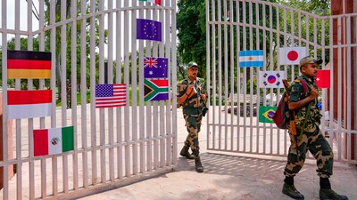 Flags of the countries participating in the upcoming G20 Summit put up at the entrance gate Gandhi Darshan Museum. (PTI) Flags of the countries participating in the upcoming G20 Summit put up at the entrance gate Gandhi Darshan Museum. (PTI)