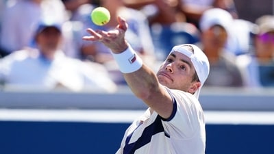 John Isner of the United States serves against Michael Mmoh at the US Open (USA TODAY Sports via Reuters Con)