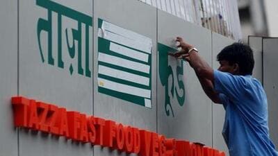 The Federation of Retail Traders Welfare Association has for years resisted strong-arm tactics by political groups to force shopkeepers to prominently put up signboards in Marathi (File Photo) The Federation of Retail Traders Welfare Association has for years resisted strong-arm tactics by political groups to force shopkeepers to prominently put up signboards in Marathi (File Photo)