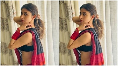 In nude eyeshadow, mascara-laden eyelashes, feathered eyebrows, contoured cheeks, a shade of nude lipstick and a small black bindi, Mouni looked stunning.&nbsp; (Instagram/@imouniroy)