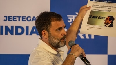 Congress party leader Rahul Gandhi holds a printout of news media report on industrialist Gautam Adani during a media briefing in Mumbai, India, on Thursday, August 31, 2023. (Photo by Satish Bate/ Hindustan Times) Congress party leader Rahul Gandhi holds a printout of news media report on industrialist Gautam Adani during a media briefing in Mumbai, India, on Thursday, August 31, 2023. (Photo by Satish Bate/ Hindustan Times)
