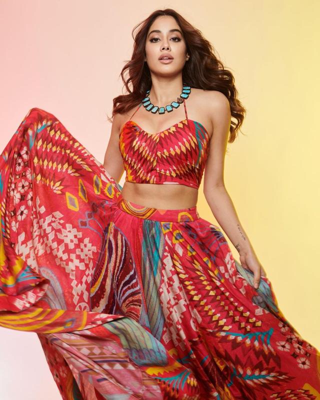 Janhvi Kapoor in a red vibrant lehenga (Photo: Instagram) Janhvi Kapoor in a red vibrant lehenga (Photo: Instagram)