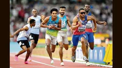 Rajesh Ramesh (centre) and the US’s Justin Robinson (right) during the men’s 4X400m relay final at the World Athletics Championships. (Getty Images) Rajesh Ramesh (centre) and the US’s Justin Robinson (right) during the men’s 4X400m relay final at the World Athletics Championships. (Getty Images)