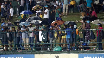 Eventually, it was decided that no play was possible and the two teams shook hands. (AP) Eventually, it was decided that no play was possible and the two teams shook hands. (AP)