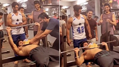 The image shows a man cutting a cake using a barbell. (X/@Puneite_) The image shows a man cutting a cake using a barbell. (X/@Puneite_)