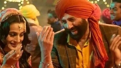 Ameesha Patel and Sunny Deol in a still from Gadar 2.