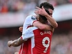 Arsenal's Brazilian striker #09 Gabriel Jesus (R) and Arsenal's English midfielder #41 Declan Rice (L) celebrate on the pitch