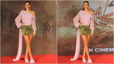 Ananya Panday slipped into a lavender-coloured blouse and an olive green mini skirt set, nailing the colour-blocking trend. The top features a drop shoulder detail, full-length sleeves with cinched cuffs, a gathered design, and a train on the back in a floor-sweeping length. Meanwhile, the skirt has a gathered design on the front, a figure-hugging design, a rose-shaped addition, and a short hem length. (HT Photo/Varinder Chawla) Ananya Panday slipped into a lavender-coloured blouse and an olive green mini skirt set, nailing the colour-blocking trend. The top features a drop shoulder detail, full-length sleeves with cinched cuffs, a gathered design, and a train on the back in a floor-sweeping length. Meanwhile, the skirt has a gathered design on the front, a figure-hugging design, a rose-shaped addition, and a short hem length. (HT Photo/Varinder Chawla)