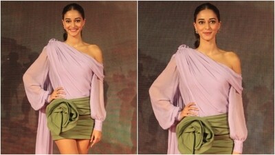 Ananya styled the ensemble with striking accessories, including fur-adorned high heels, gold anklets, and statement earrings. A centre-parted sleek ponytail, winged eyeliner, subtle eye shadow, mascara-adorned eyelashes, darkened brows, rouge-tinted cheeks, and glowing skin rounded off the glam picks. (HT Photo/Varinder Chawla) Ananya styled the ensemble with striking accessories, including fur-adorned high heels, gold anklets, and statement earrings. A centre-parted sleek ponytail, winged eyeliner, subtle eye shadow, mascara-adorned eyelashes, darkened brows, rouge-tinted cheeks, and glowing skin rounded off the glam picks. (HT Photo/Varinder Chawla)