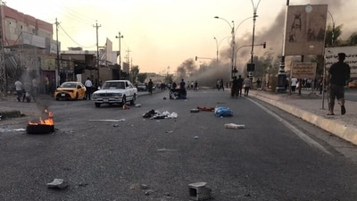 Iraqi protesters block a road following protests in the multi-ethnic Iraqi city of Kirkuk on September 2. (AFP) Iraqi protesters block a road following protests in the multi-ethnic Iraqi city of Kirkuk on September 2. (AFP)