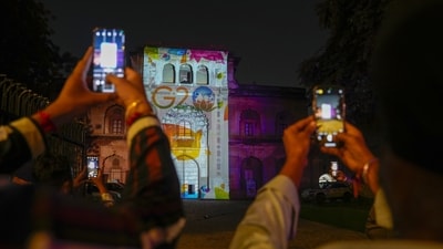 In this photo, people witness a light show at Safdarjung Tomb ahead of summit, in New Delhi. India assumed the presidency of the G20 forum in December last year, taking over from Indonesia. Several world leaders including US president Joe Biden, France's Emmanuel Macron, Canada's Justin Trudeau among others will arrive in India next week to participate in the summit. (PTI)