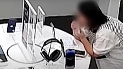 Chinese woman bites through security wire to steal iPhone. (South China Morning post)