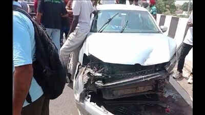 The mangled car that hit two bikes on the flyover near Kharar’s Khanpur village on Sunday. (HT Photo) The mangled car that hit two bikes on the flyover near Kharar’s Khanpur village on Sunday. (HT Photo)