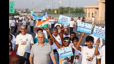U.P. chief secretary Durga Shankar Mishra (in striped T-shirt) at ‘Jal Ke Liye Chal’ campaign in Lucknow. (Sourced)