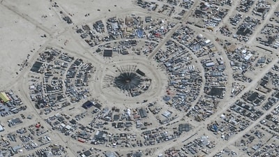 This handout satellite image courtesy of Maxar Technology shows an overview of the annual Burning Man festival underway in Nevada�s Black Rock desert on August 29, 2023. (AFP) This handout satellite image courtesy of Maxar Technology shows an overview of the annual Burning Man festival underway in Nevada�s Black Rock desert on August 29, 2023. (AFP)