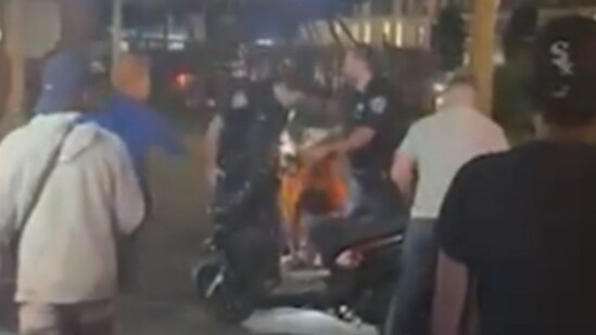 A video showed several people engaged in an altercation with cops while trying to conduct a scooter crackdown at West 71st Street and Broadway on the Upper West Side, near the Stratford Arms Hotel (New York Post screenshot)