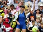 Caroline Wozniacki of Denmark gestures to the crowd after being defeated by Coco Gauff of the United States during their Women's Singles Fourth Round match on Day Seven of the 2023 US Open