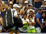Iga Swiatek of Poland waves to the crowd while leaving the court after her match against Jelena Ostapenko of Latvia (not pictured) on day seven of the 2023 U.S. Open tennis tournament at USTA Billie Jean King National Tennis Cente
