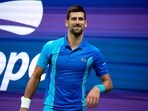 Novak Djokovic, of Serbia, smiles as he plays Borna Gojo, of Croatia, during the fourth round of the U.S. Open tennis championships, Sunday Novak Djokovic, of Serbia, smiles as he plays Borna Gojo, of Croatia, during the fourth round of the U.S. Open tennis championships, Sunday