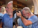 The image, taken from the video, shows the moment the daughter surprised her father on his 60th birthday. 
