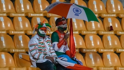 Fans wait as the play is interrupted by rain during the Asia Cup match between India and Nepal in Pallekele (AP) Fans wait as the play is interrupted by rain during the Asia Cup match between India and Nepal in Pallekele (AP)